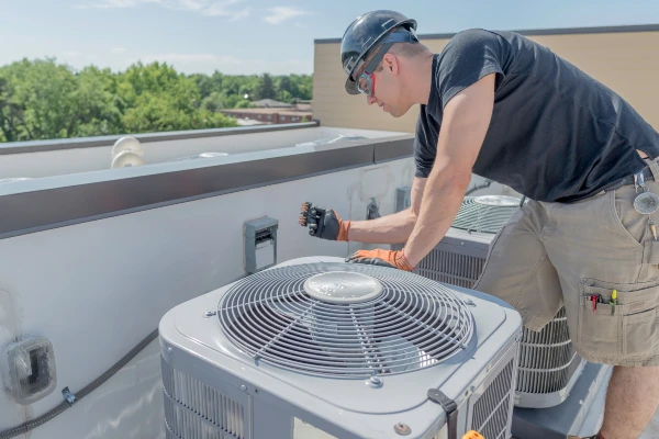 man doing preventative maintenance and repair in oklahoma city