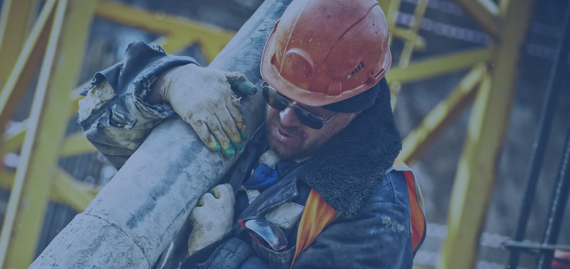 professional carrying a gray pipe