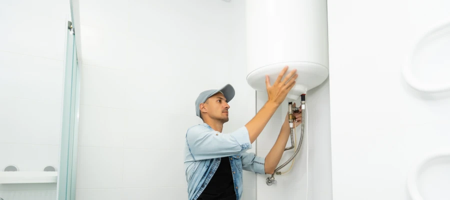 professional repairing a water heater
